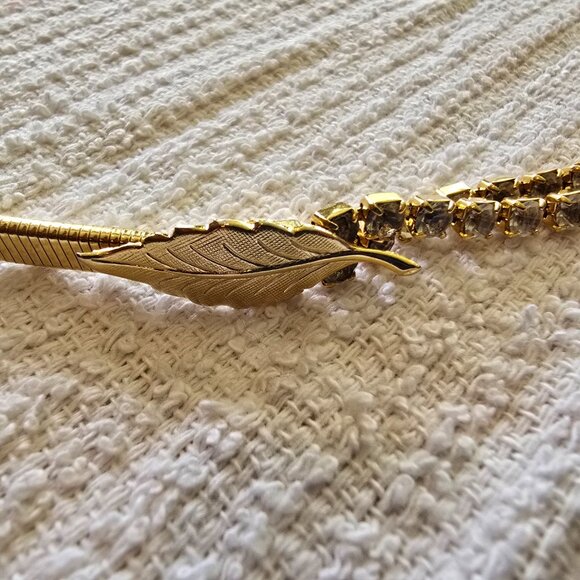 Vintage Gold Slim Belt with Leaf Closure and Twisting Rhinestone Details - Picture 2 of 9